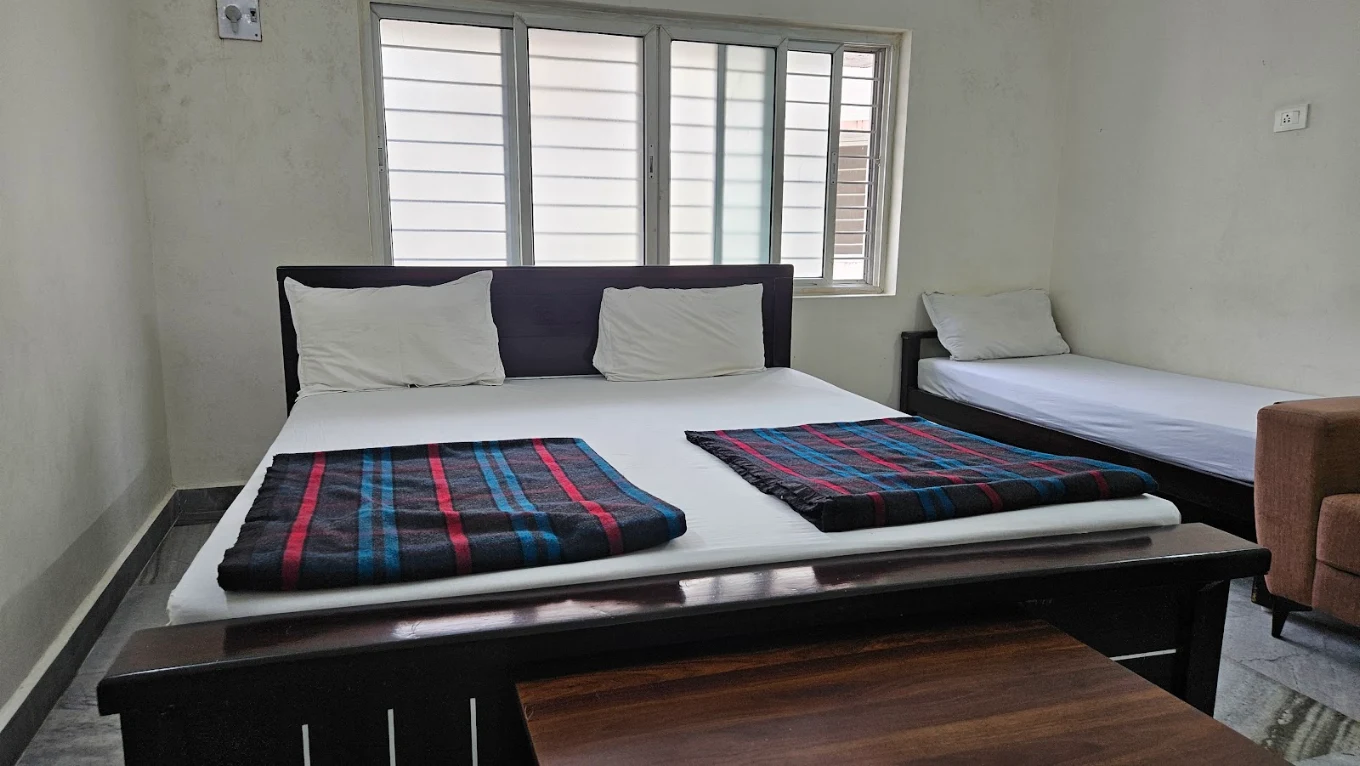 Room interior at Mathrusri Vakuladevi Rest House